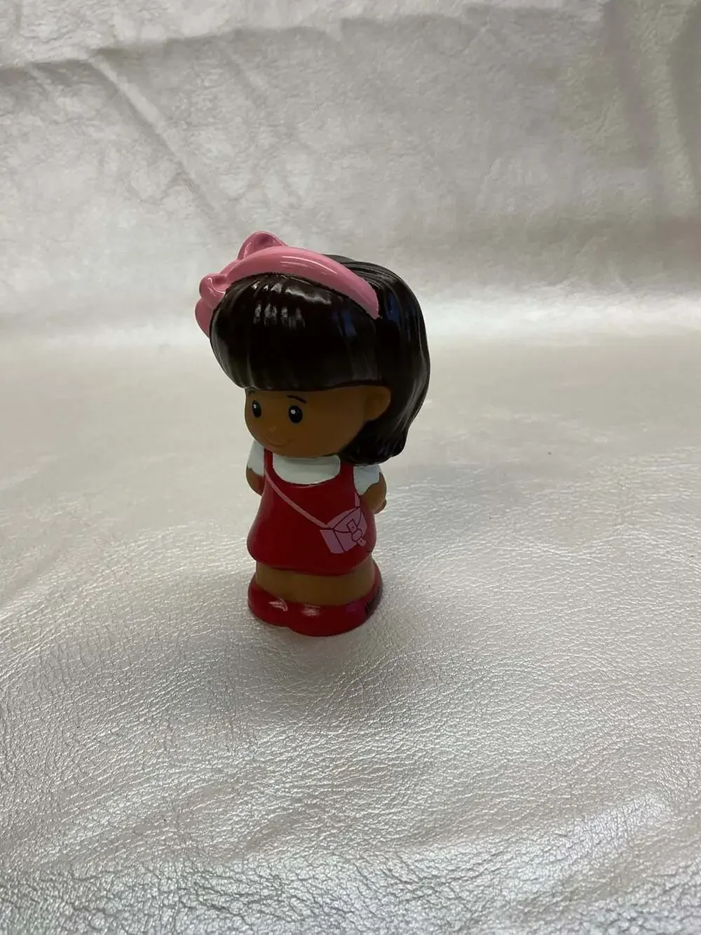 Fisher-Price Little People Mia Figure in Red Dress with Pink Bow